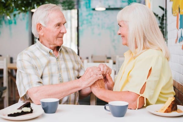 Seniors reassuring each other to help with anxiety and stress using one of the Three C's.